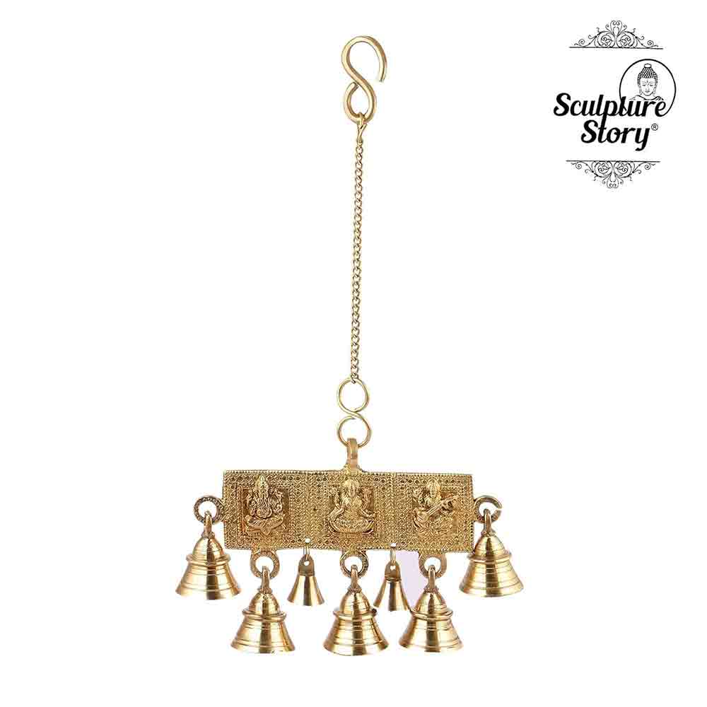 Brass Wall Hanging of Lord Ganesha, Goddess Lakshmi & Goddess Saraswati with Bells | 15 Inch Handmade Designer Brass Sculpture | Traditional Indian Wall Décor for Pooja Room, Temple, Home