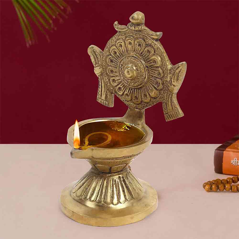 Brass Vishnu Chakra Diya for Puja & Home Décor – Traditional Oil Lamp for Diwali, Festive Decoration, Office & Temple Use | 4.3-Inch Height | Golden Finish | Handcrafted Gift Item