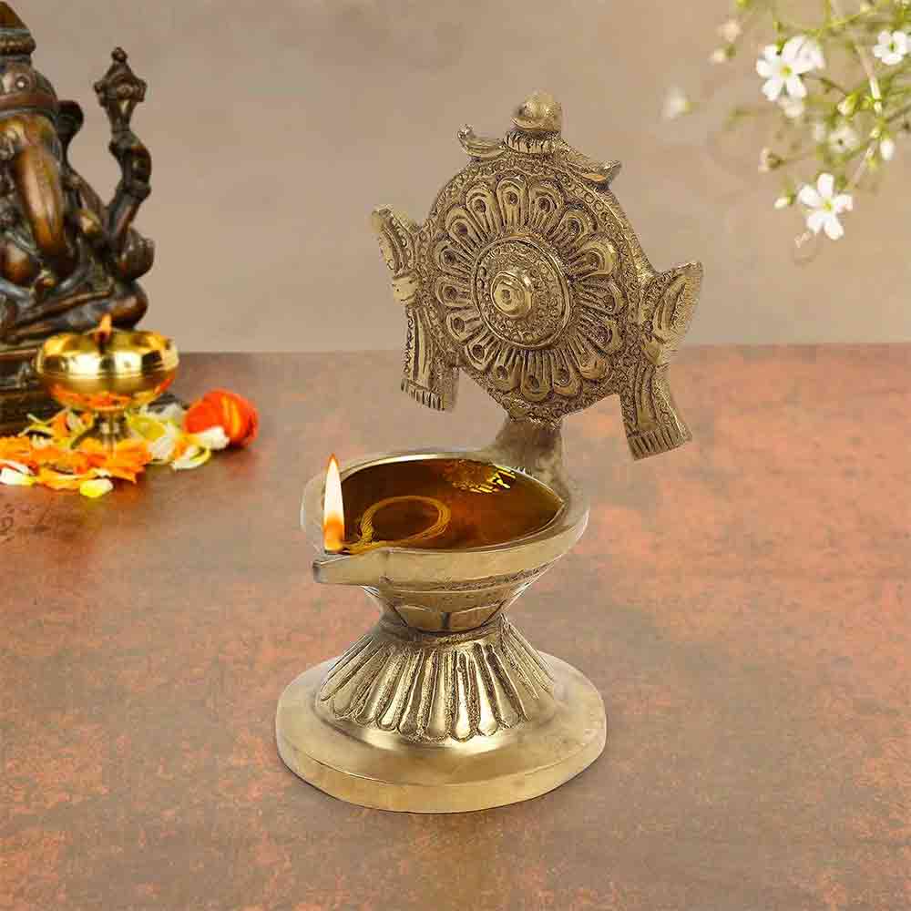 Brass Vishnu Chakra Diya for Puja & Home Décor – Traditional Oil Lamp for Diwali, Festive Decoration, Office & Temple Use | 4.3-Inch Height | Golden Finish | Handcrafted Gift Item